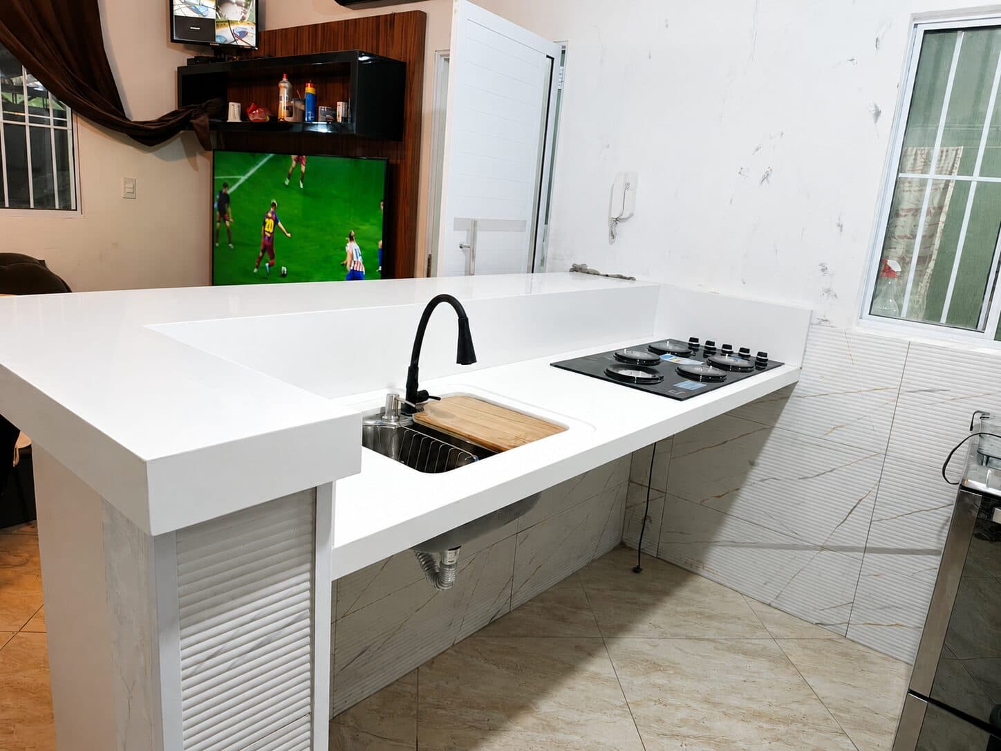 Kitchen with stone countertop and finishing
